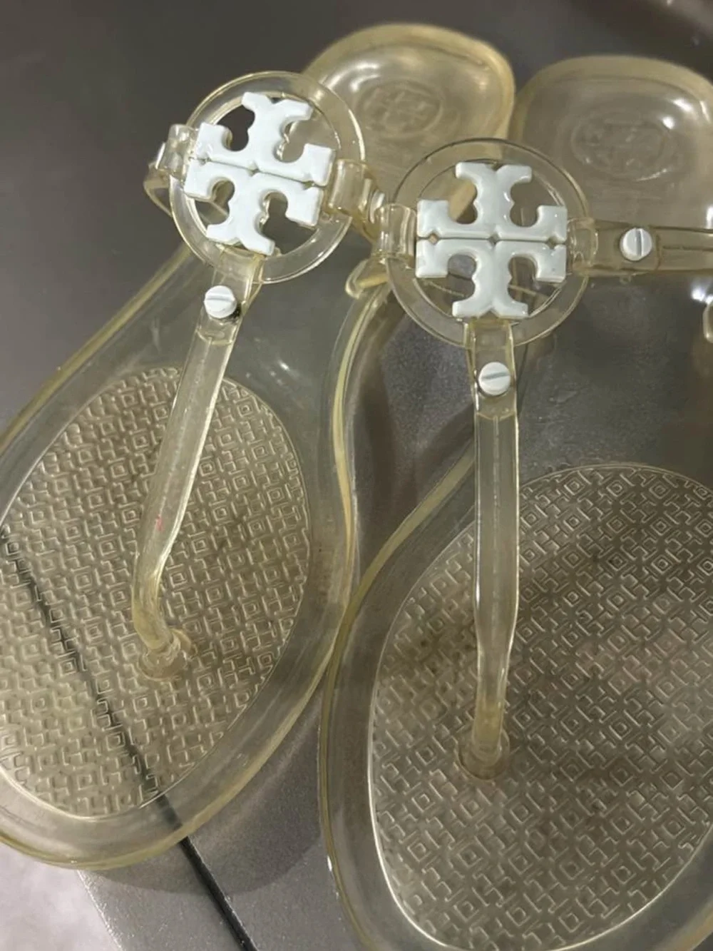 Tory Burch Translucent Jelly Thong Sandals with White Logo Medallions